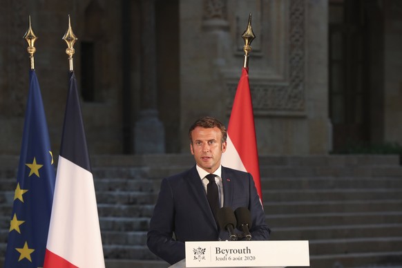 epa08588050 French President Emmanuel Macron delivers his speech during a press conference in Beirut, Lebanon, 06 August 2020. The blast, which killed more than 130 people, wounded thousands and left  ...