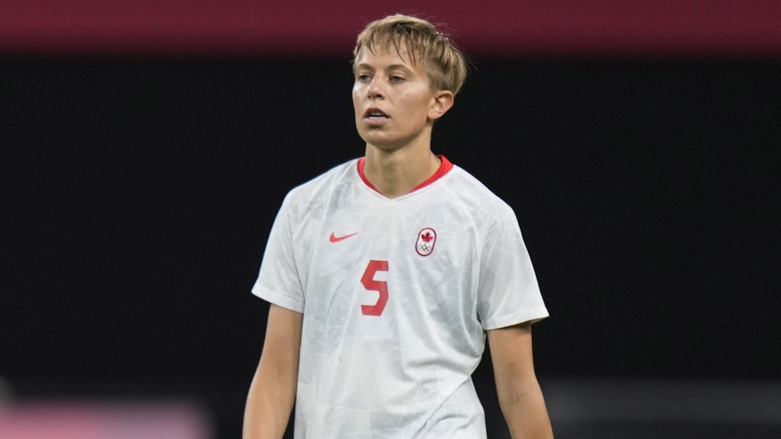 Canada&#039;s Quinn leaves the field at the end of a women&#039;s soccer match against Chile at the 2020 Summer Olympics, Saturday, July 24, 2021, in Sapporo, Japan. (AP Photo/Silvia Izquierdo)