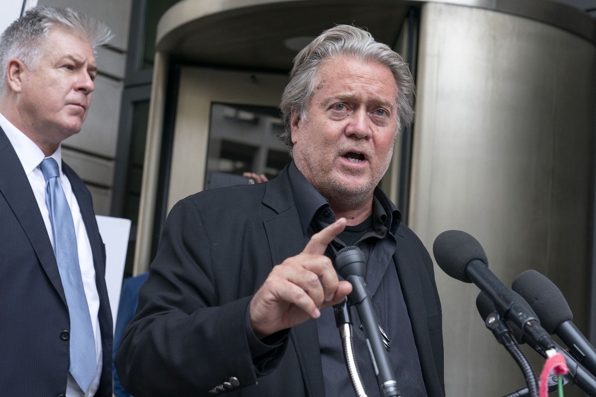 Steve Bannon accompanied by his attorney M. Evan Corcoran, speaks to the media as he departs the federal court in Washington, Thursday, July 21, 2022. Bannon was brought to trial on a pair of federal  ...