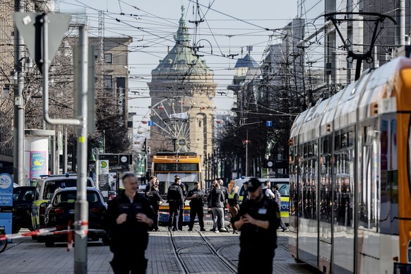 epa11938010 A general view shows the scene after a SUV vehicle was driven into pedestrians in Mannheim, Germany, 03 March 2025. According to statements from police, a vehicle drove into a crowd in the ...