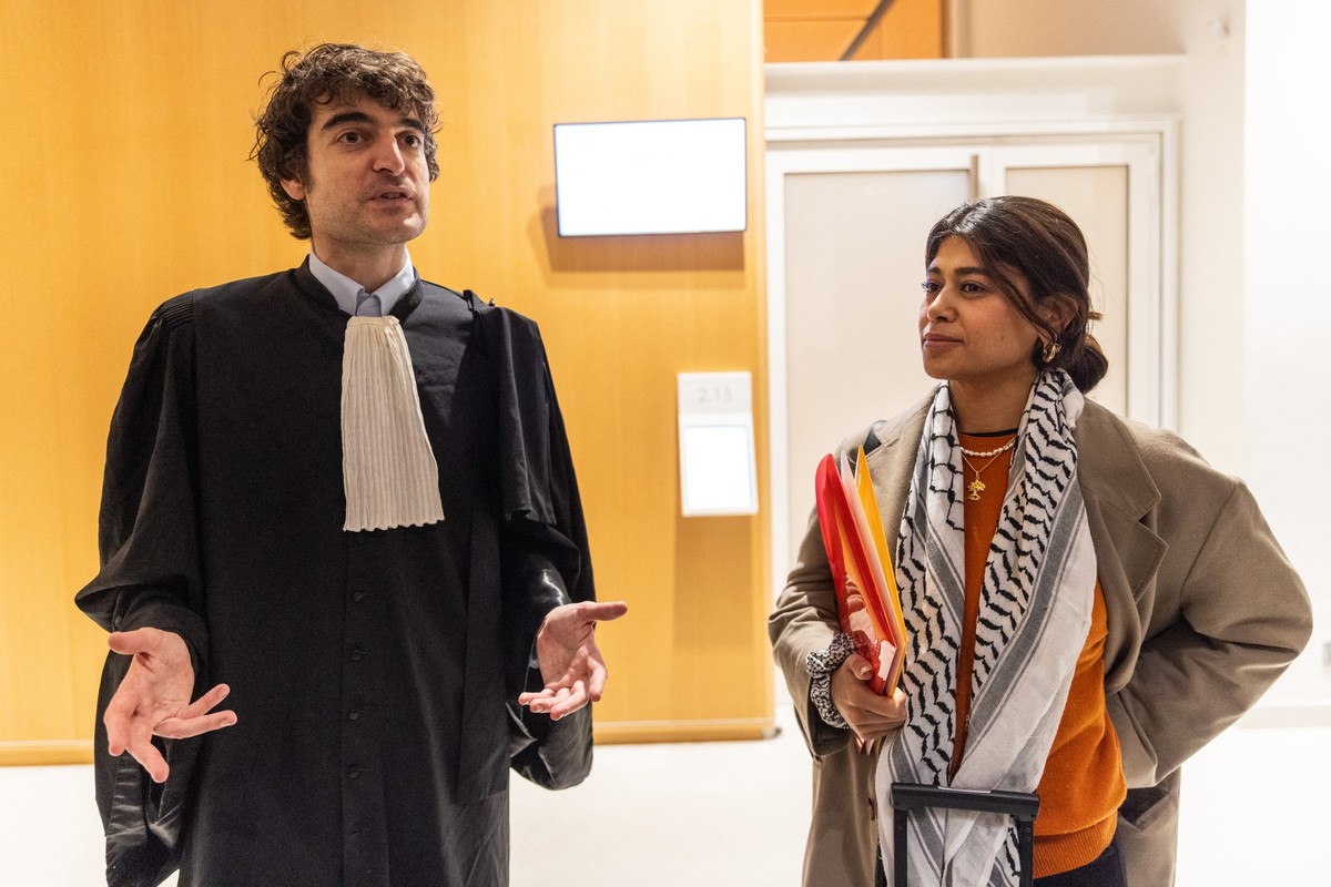 PARIS, FRANCE - OCTOBER 20: French member of the European Parliament and member of La France Insoumise Rima Hassan and her lawyer Vincent Brengarth leave the Paris courthouse after her trial over alle ...