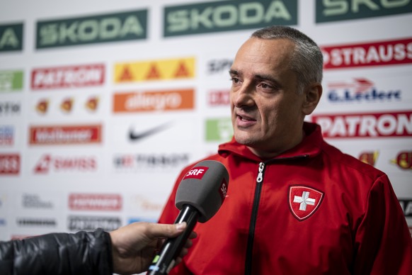 Switzerland's Headcoach Jan Cadieux speaks with journalists in the mixed zone after a training of team Switzerland in the practice rink in the Swiss Life Arena in Zuerich, Switzerland on Wednesda ...