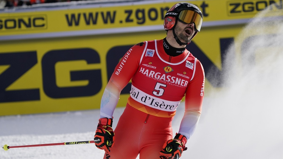 Switzerland's Loic Meillard arrives at the finish area of an alpine ski, men's World Cup giant slalom, in Val D'Isere, France, Saturday, Dec.10, 2022. (AP Photo/Giovanni Auletta)