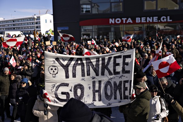 People at a demonstration march ending in front of the US consulate, under the slogan, Greenland belongs to the Greenlandic people, in Nuuk, Greenland, Saturday March 15, 2025. (Christian Klindt Soelb ...