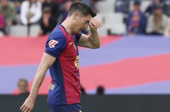 epa12041239 FC Barcelona&#039;s Robert Lewandowski reacts during the Spanish LaLiga soccer match between FC Barcelona and Celta de Vigo, at Olimpic Lluis Companys Stadium, in Barcelona, Catalonia, Spa ...