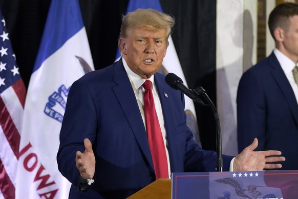 CORRECTS TOWN AND LOCATION - Former President Donald Trump speaks with campaign volunteers at the Elks Lodge, Tuesday, July 18, 2023, in Cedar Rapids, Iowa.  (AP Photo/Charlie Neibergall)