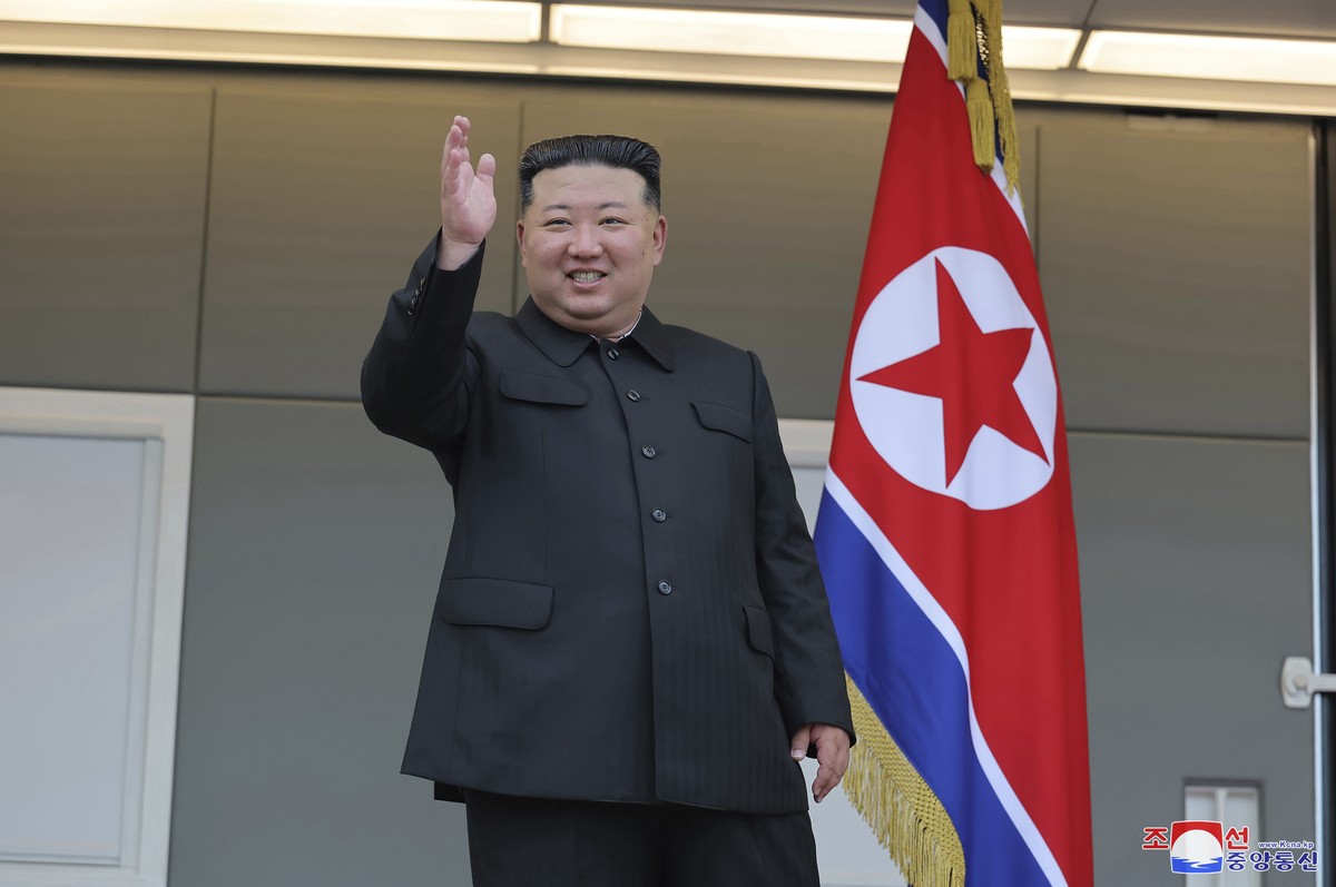 In this photo taken during a two-day trip on Aug. 8 and Aug. 9, 2024 and provided by the North Korean government, North Korean leader Kim Jong Un visits a flood-hit area in Uiju, North Phyongan provin ...