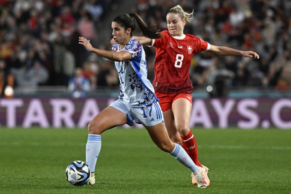 Spain&#039;s Alba Redondo takes the ball away from Switzerland&#039;s Nadine Riesen, right, during the Women&#039;s World Cup second round soccer match between Switzerland and Spain at Eden Park in Au ...