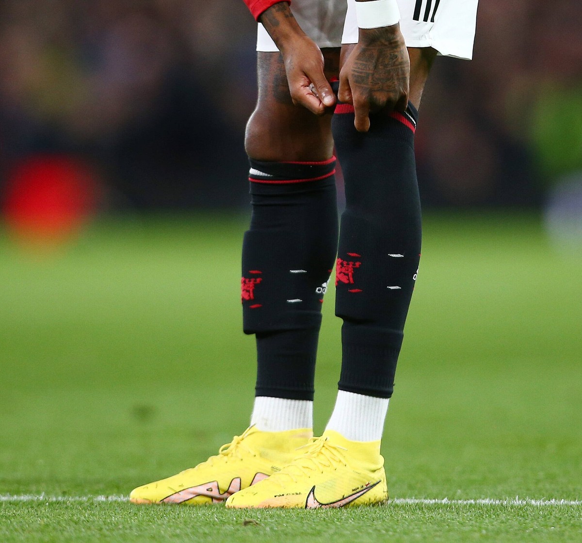Mandatory Credit: Photo by Matt West/Shutterstock 13477661cm Marcus Rashford of Manchester United, ManU pulls his socks up Manchester United v Tottenham Hotspur, Premier League, Football, Old Trafford ...