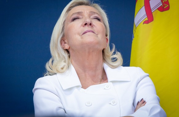 epa12166325 Marine Le Pen, President of the National Rally group in the National Assembly, attends the Victory Day rally organized by the European nationalist and far-right political party Patriotes.e ...