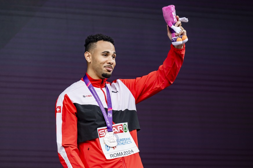 Bronze medalist Jason Joseph of Switzerland for the men&#039;s 110 meters hurdles, celebrates during the medals ceremony at the European Athletics Championships, in the Olympic stadium, in Rome, Italy ...