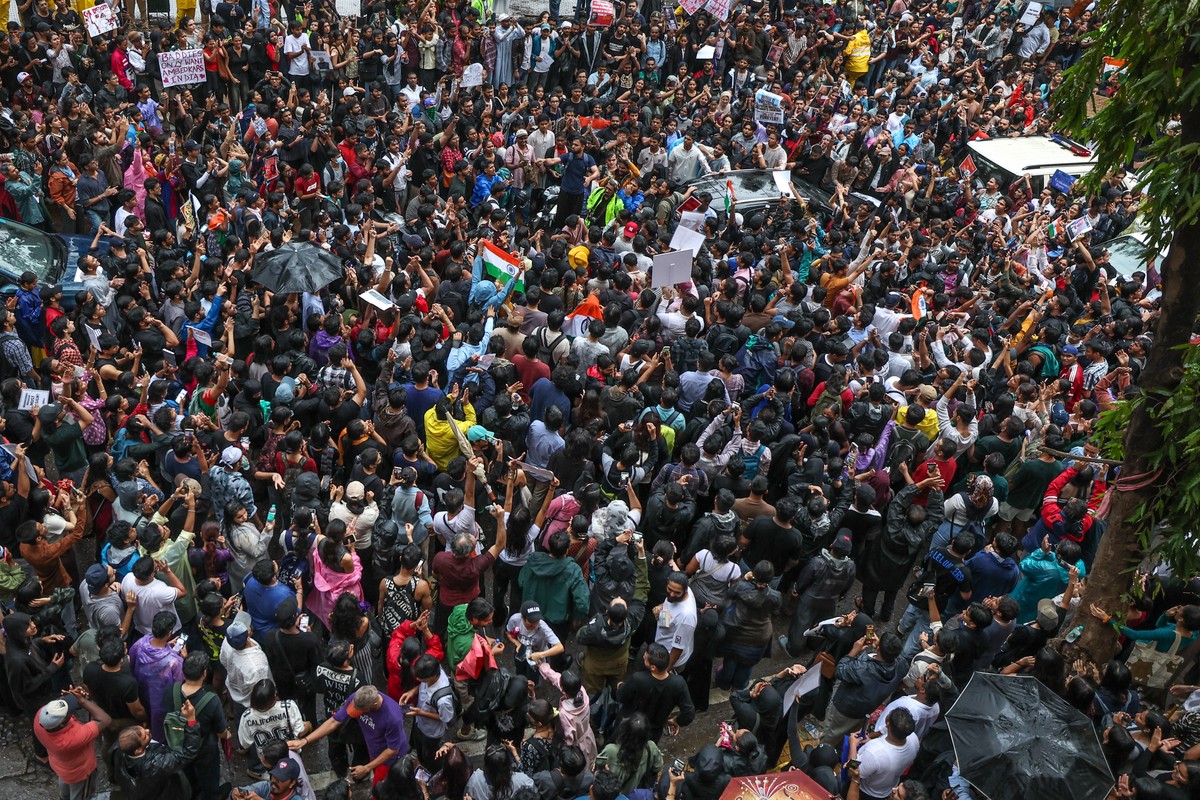 epa13126828 Supporters of the Cockroach Janta Party (CJP) hold placards and shout slogans as they gather for a protest march in Mumbai, India, 22 July 2026, demanding Union Education Minister Dharmend ...