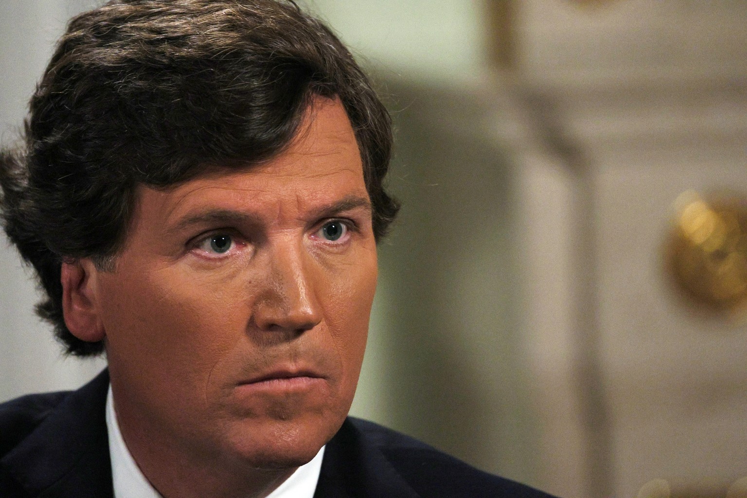 epa11138510 US journalist Tucker Carlson listens to Russian President Vladimir Putin during an interview at the Kremlin in Moscow, Russia, 09 February 2024. EPA/GAVRIIL GRIGOROV/SPUTNIK/KREMLIN POOL M ...