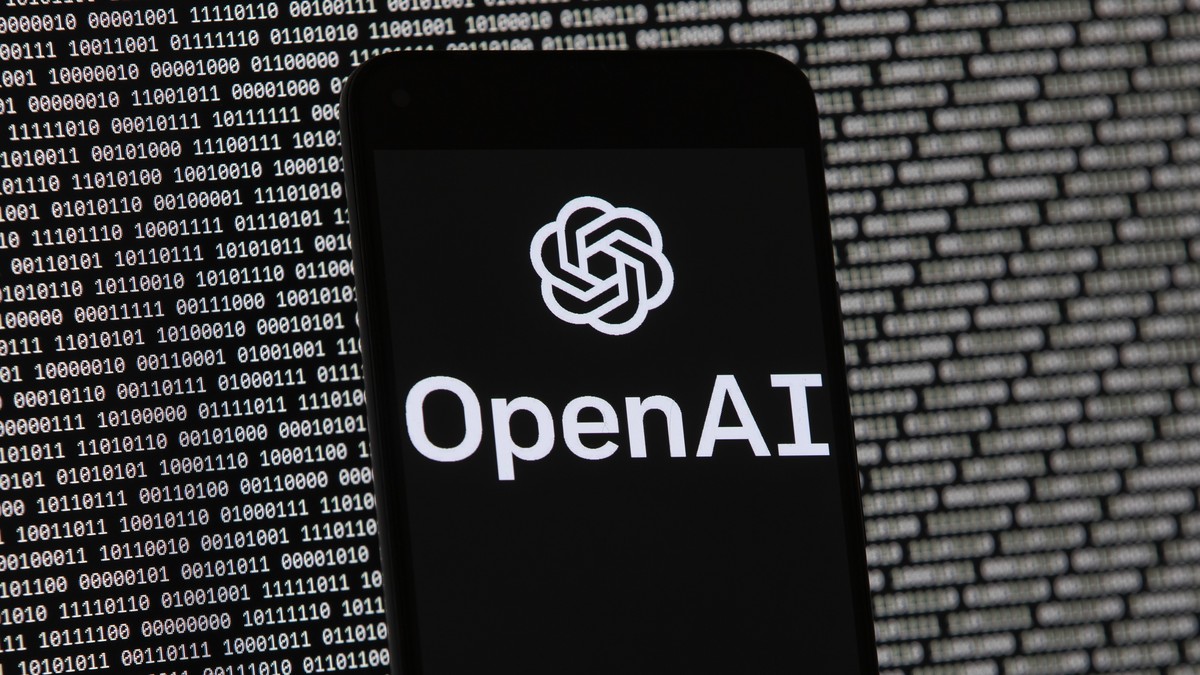FILE - The OpenAI logo appears on a mobile phone in front of a computer screen with random binary data, March 9, 2023, in Boston. San Francisco-based OpenAI said Thursday, July 25, 2024, it is releasi ...