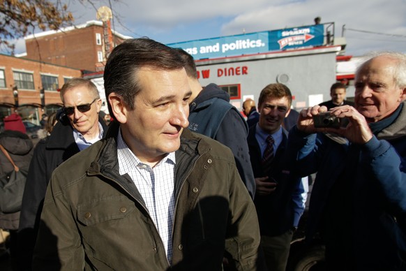 MANCHESTER, NH - FEBRUARY 09: Republican presidential candidate Ted Cruz leaves a campaign stop on February 9, 2016 at the Red Arrow Diner in Manchester, New Hampshire. Voters throughout the state are ...