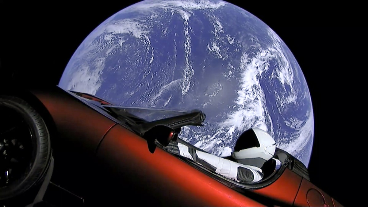 This image from video provided by SpaceX shows the company's spacesuit in Elon Musk's red Tesla sports car which was launched into space during the first test flight of the Falcon Heavy rock ...