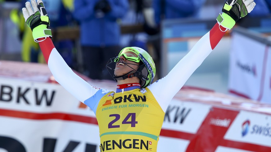 Switzerland&#039;s Ramon Zenhaeussern celebrates after completing an alpine ski, men&#039;s World Cup slalom in Wengen, Switzerland, Sunday, Jan. 14, 2018. (AP Photo/Alessandro Trovati)