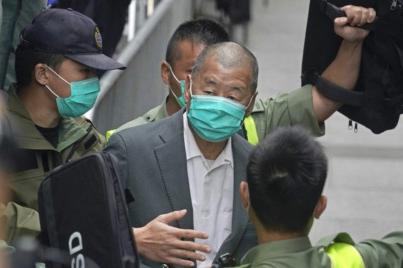 FILE - In this Feb. 9, 2021, file photo, democracy advocate Jimmy Lai leaves the Hong Kong&#039;s Court of Final Appeal in Hong Kong. Prominent Hong Kong democracy advocate and newspaper publisher Lai ...