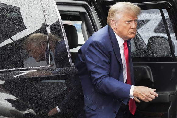 FILE - Former President Donald Trump arrives to board his plane at Ronald Reagan Washington National Airport, Aug. 3, 2023. Trump is set to return for the first time in months to the federal courthous ...