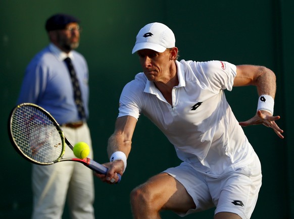 epa06074251 Kevin Anderson of South Africa in action against Ruben Bemelmans of Belgium during their third round match for the Wimbledon Championships at the All England Lawn Tennis Club, in London, B ...