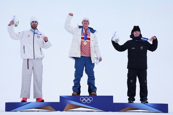From left, silver medalist United States' Alex Hall, gold medalist Norway's Birk Ruud and bronze medalist New Zealand's Luca Harrington celebrate after the men's freestyle skiing s ...