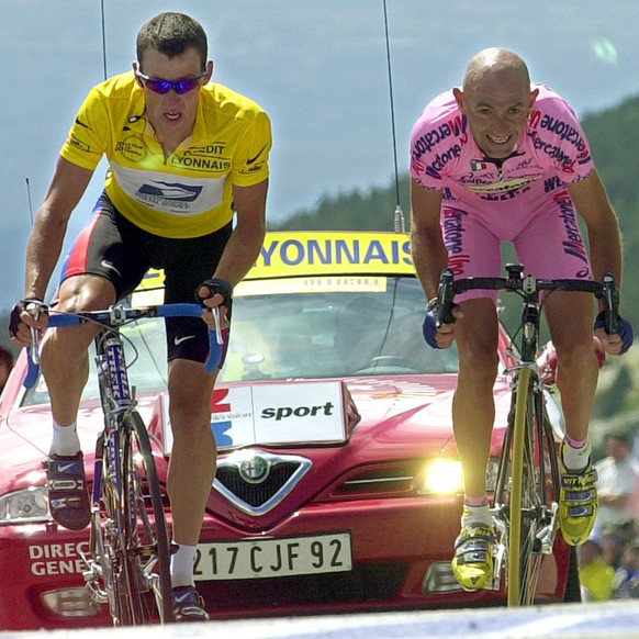 Marco Pantani of Italy, right, sprints to beat overall leader Lance Armstrong of Austin, Texas, and win the 12th stage of the Tour de France cycling race between Carpentras and Mont Ventoux, southern  ...