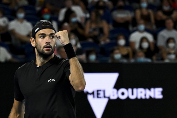 epa09703959 Matteo Berrettini of Italy in action against Pablo Carreno Busta of Spain during their 4th round match on Day 7 of the Australian Open at Melbourne Park in Melbourne, Australia, 23 January ...