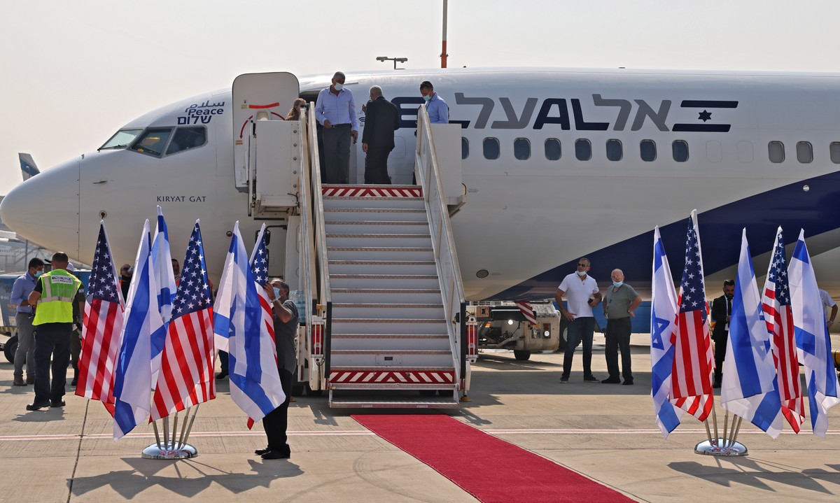 epa08636801 The El Al's airliner, which will carry a US-Israeli delegation to the UAE following a normalisation accord, sitting on the tarmac ahead of the first-ever commercial flight from Israel ...