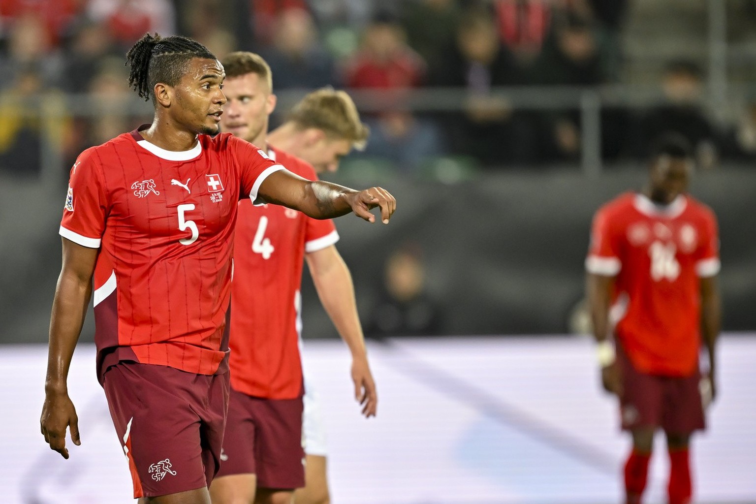 Switzerland&#039;s Manuel Akanji reacts during the UEFA Nations League Group D soccer match between Switzerland and Denmark, on Tuesday, October 15, 2024, at the kybunpark stadium, in St. Gallen, Swit ...