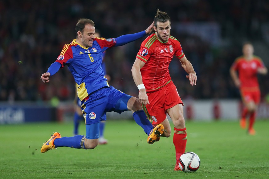 Football - Wales v Andorra - UEFA Euro 2016 Qualifying Group B - Cardiff City Stadium, Cardiff, Wales - 13/10/15
Wales&#039; Gareth Bale in action with Andorra&#039;s Ildefons Lima 
Action Images vi ...