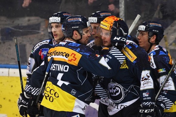 Ambri&#039;s player Nick Plastino and Ambri&#039;s player Dominic Zwerger celebrate 3-1 goal, during the preliminary round game of National League Swiss Championship 2017/18 between HC Ambr Piotta an ...