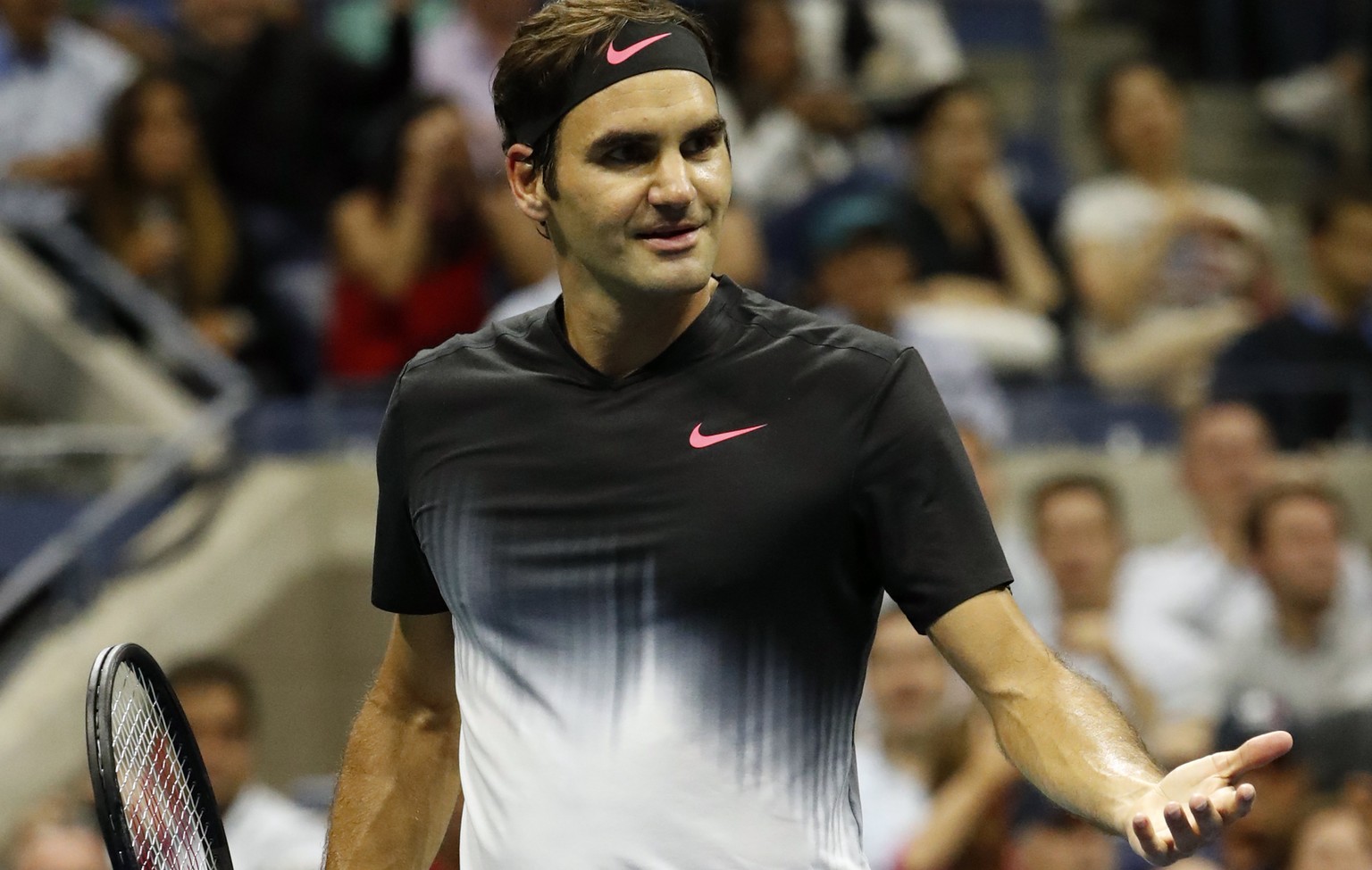 epa06188951 Roger Federer of Switzerland reacts after losing a point against Juan Martin del Potro of Argentina during their US Open Tennis Championships quarterfinals round match at the USTA National ...