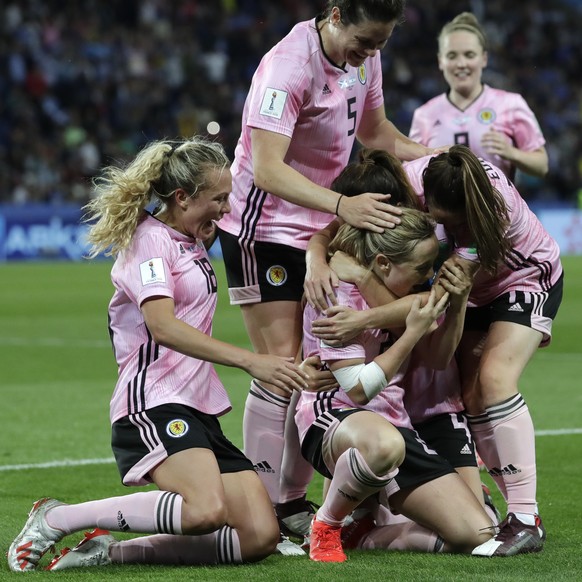 Scotland&#039;s Erin Cuthbert, center, celebrates with teammates after scoring their side&#039;s third goal during the Women&#039;s World Cup Group D soccer match between Scotland and Argentina at Par ...