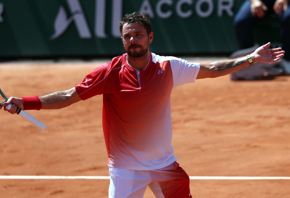 epa12992853 Stan Wawrinka of Switzerland reacts after winning the second set during his Men's 1st round match against Jesper de Jong of the Netherlands at the French Open Grand Slam tennis tourna ...