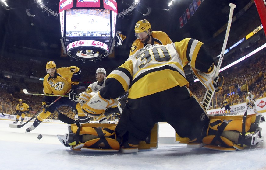 Nashville Predators center Calle Jarnkrok (19), of Sweden, shoots the puck past Pittsburgh Penguins goalie Matt Murray (30) for a goal during the first period in Game 4 of the NHL hockey Stanley Cup F ...