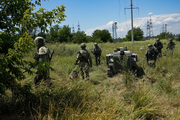 Russian mine clearance experts are preparing to use a robotic vehicle to defuse mines along the high-voltage power line in Mariupol, in the territory under the government of the Donetsk people.