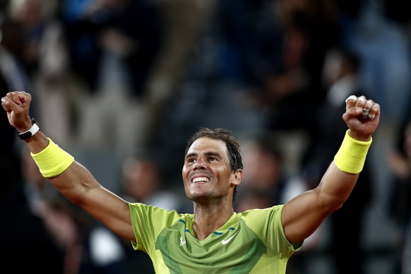 epaselect epa09988847 Rafael Nadal of Spain celebrates winning against Novak Djokovic of Serbia in their men?s quarterfinal match during the French Open tennis tournament at Roland ?Garros in Paris, F ...