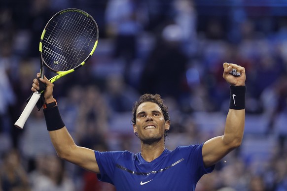 Rafael Nadal of Spain celebrates after winning his men's semifinals match against Marin Cilic of Croatia in the Shanghai Masters tennis tournament at Qizhong Forest Sports City Tennis Center in Shanghai, China, Saturday, Oct. 14, 2017. (AP Photo/Andy Wong)
