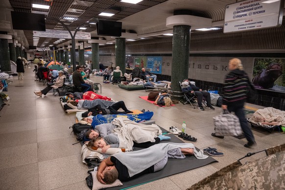People take shelter in a metro station during a night Russian attack, in Kyiv, Ukraine, early Thursday, Aug. 20, 2026. (AP Photo/Danylo Antoniuk) CORRECTION: photographer's name corrected to Dany ...