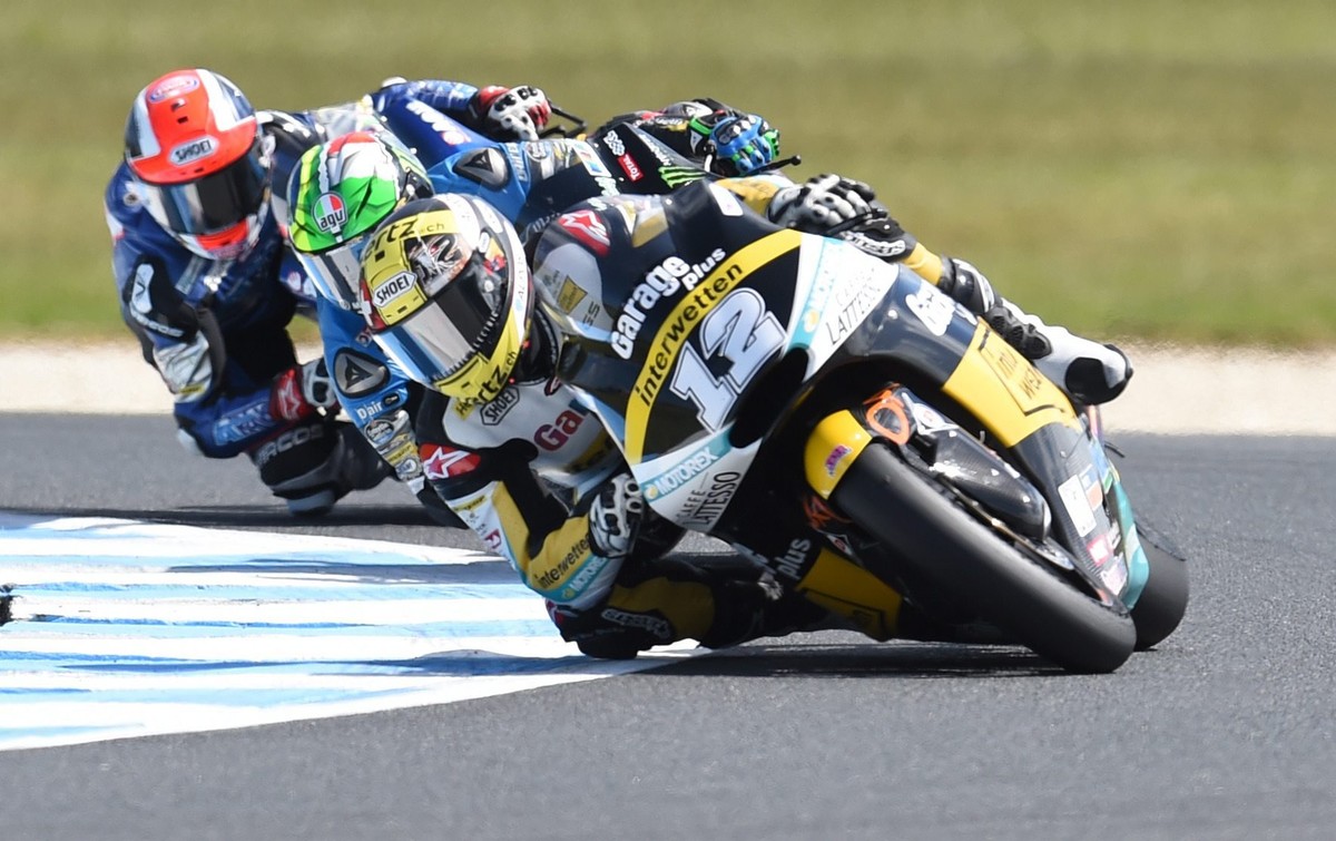 epa05598733 Thomas Luethi of Switzerland for Garage Plus Interwetten wins the Moto2 class race during the 2016 Australian MotoGP at Phillip Island, Victoria, Australia, 23 October 2016. EPA/TRACEY NEA ...