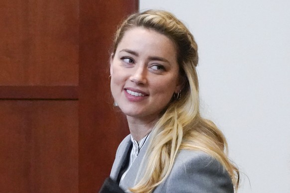 FILE - Actor Amber Heard leaves during a break in the courtroom at the Fairfax County Circuit Courthouse in Fairfax, Va., May 27, 2022. (AP Photo/Steve Helber, Pool, file)
People-Amber Heard-Twins