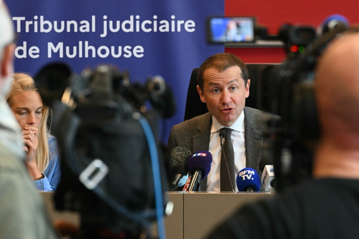 Mulhouse Public Prosecutor Nicolas Heitz (R) speaks during a press conference on a case of a child held captive in Hagenbach at a courthouse in Mulhouse, eastern France, on April 15, 2026. A nine-year ...