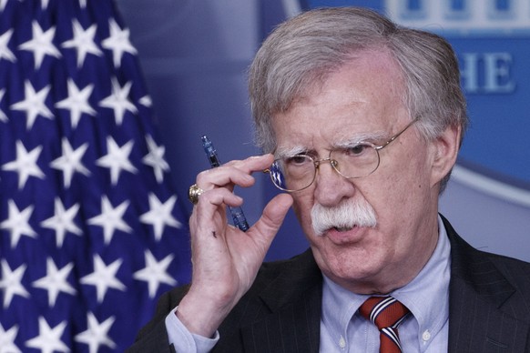 epa06924275 National Security Advisor John Bolton responds to a question from the news media during the daily briefing at the White House in Washington, DC, USA 02 August 2018. The intelligence offici ...