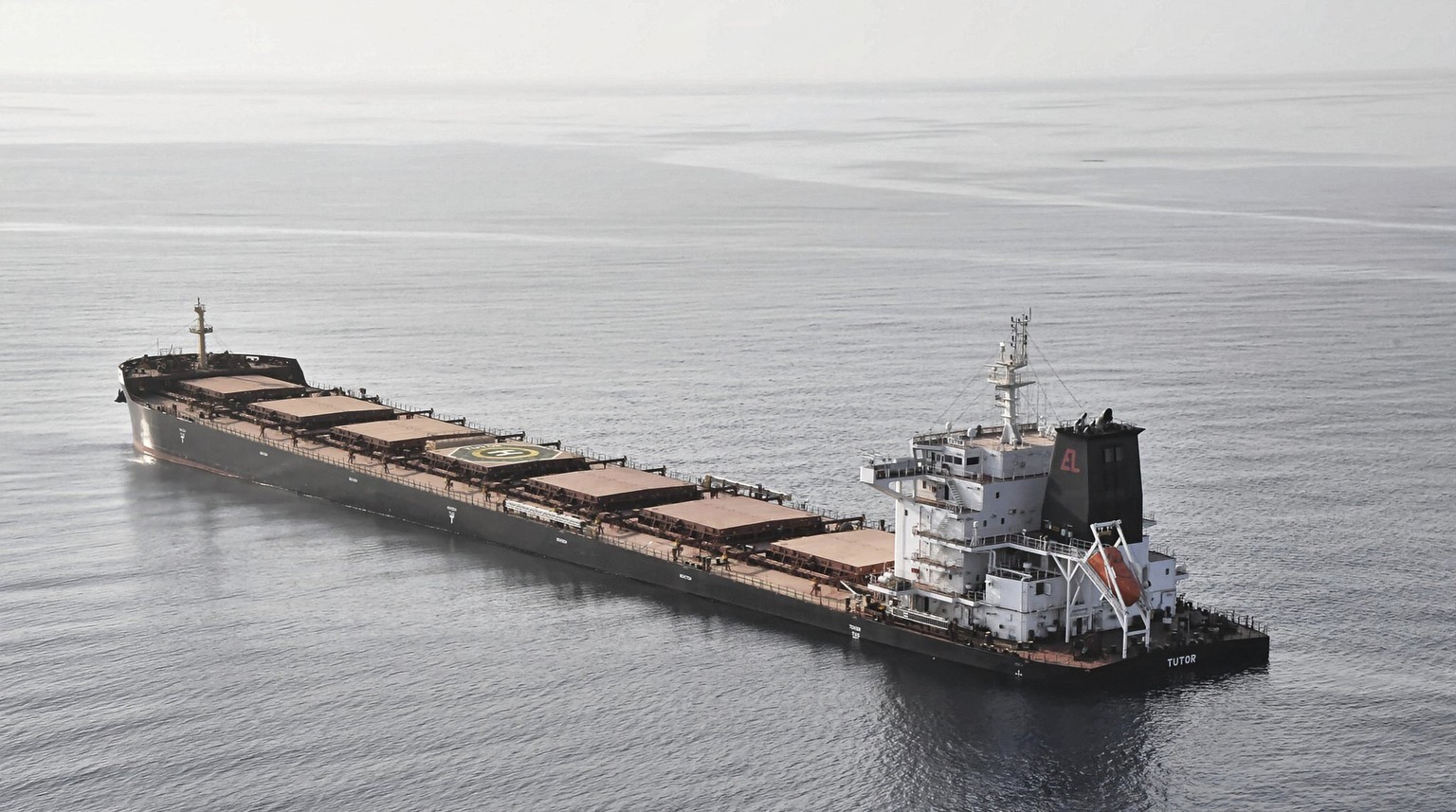 In this photo released by the Etat-Major des Arm�es, the MV Tutor sinks in the Red Sea after it was struck by a Houthi drone vessel, Wednesday, June 12, 2024. The bulk carrier sank days after an attac ...