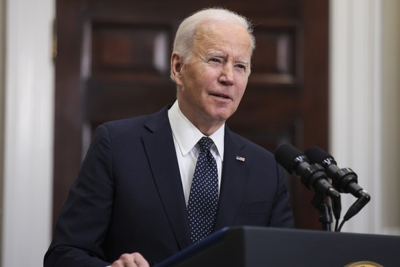 epa09770359 US President Joe Biden talks to reporters as he gives an update from the Roosevelt Room of the White House on the continued efforts to pursue deterrence and diplomacy, and Russia&#039;s bu ...
