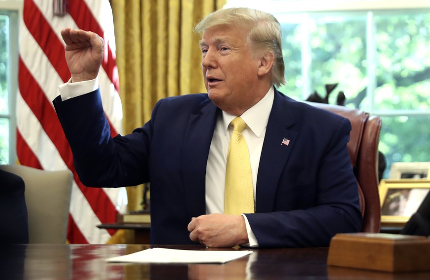 President Donald Trump speaks as he meets with Chinese Vice Premier Liu He in the Oval Office of the White House in Washington, Friday, Oct. 11, 2019. (AP Photo/Andrew Harnik)
Donald Trump,Liu He