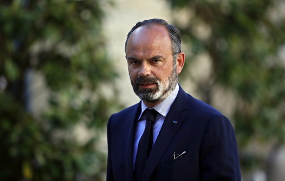 FILE - In this May 20, 2020 file photo, French Prime Minister Edouard Philippe arrives for a meeting in Paris. A special French court has ordered an investigation of three current or former government ...