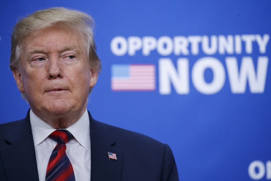 epa07512761 US President Donald J. Trump participates in an Opportunity Zone conference with State, local, tribal, and community leaders in the South Court Auditorium of the Eisenhower Executive Offic ...