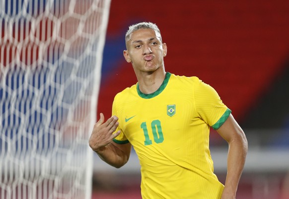 epa09358096 Richarlison of Brazil celebrates his scoring (3-0 )during the men&#039;s soccer group stage match between Germany and Brazil at the Tokyo 2020 Olympic Games in Yokohama, Japan, 22 July 202 ...