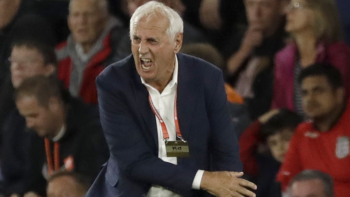 Kosovo coach Bernard Challandes reacts after his team scored during the Euro 2020 group A qualifying soccer match between England and Kosovo at St Mary's Stadium in Southampton, England, Tuesday, ...